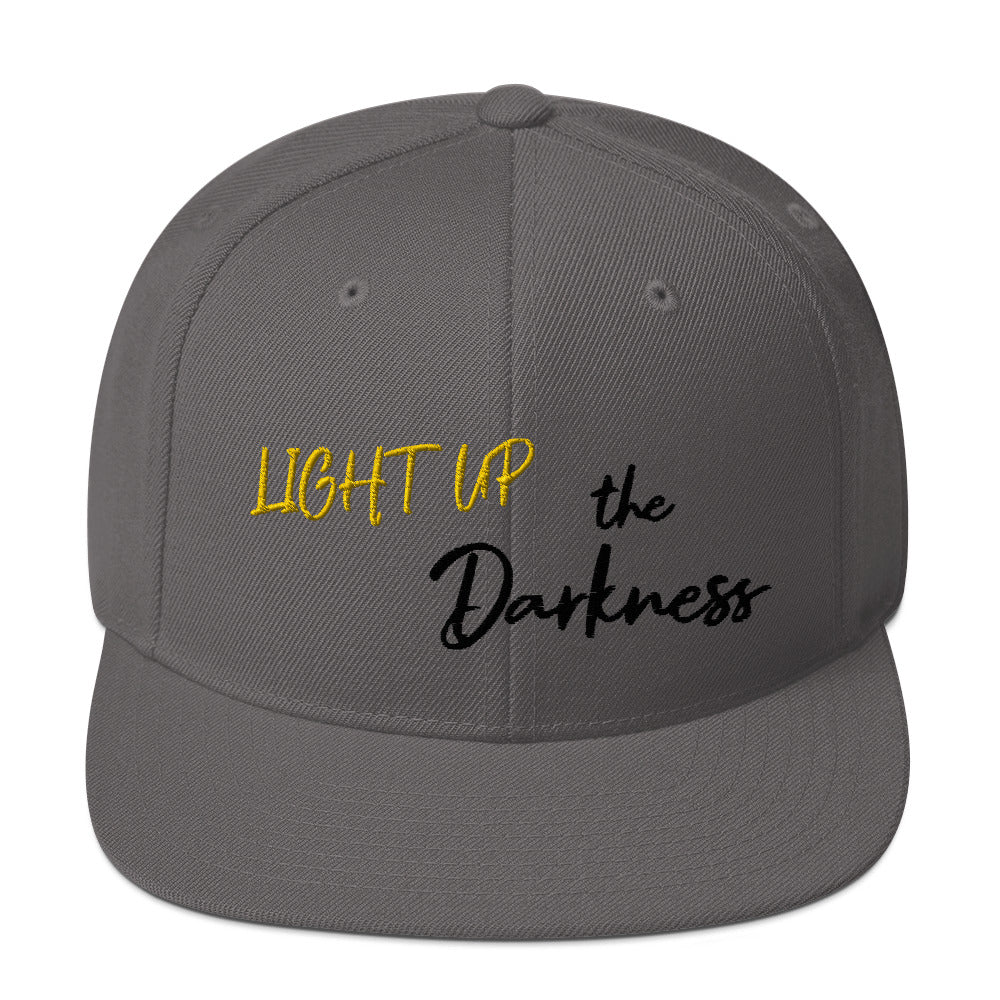 Light up the Darkness Snapback Hat (black lettering)